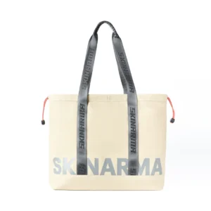 حقيبة توت Skinarma Fardel – قماش مقاوم للماء مع تصميم عملي وتنظيم داخلي ذكي