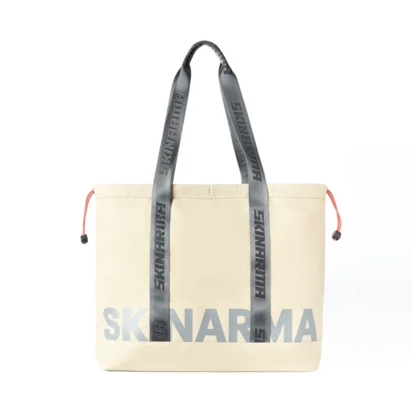 حقيبة توت Skinarma Fardel – قماش مقاوم للماء مع تصميم عملي وتنظيم داخلي ذكي