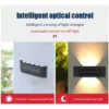 مصباح جداري شمسي LED خارجي مع حساس ضوء IP65 – إضاءة دافئة مقاومة للماء (4) مصباح جداري شمسي LED خارجي مع حساس ضوء IP65 – إضاءة دافئة مقاومة للماء